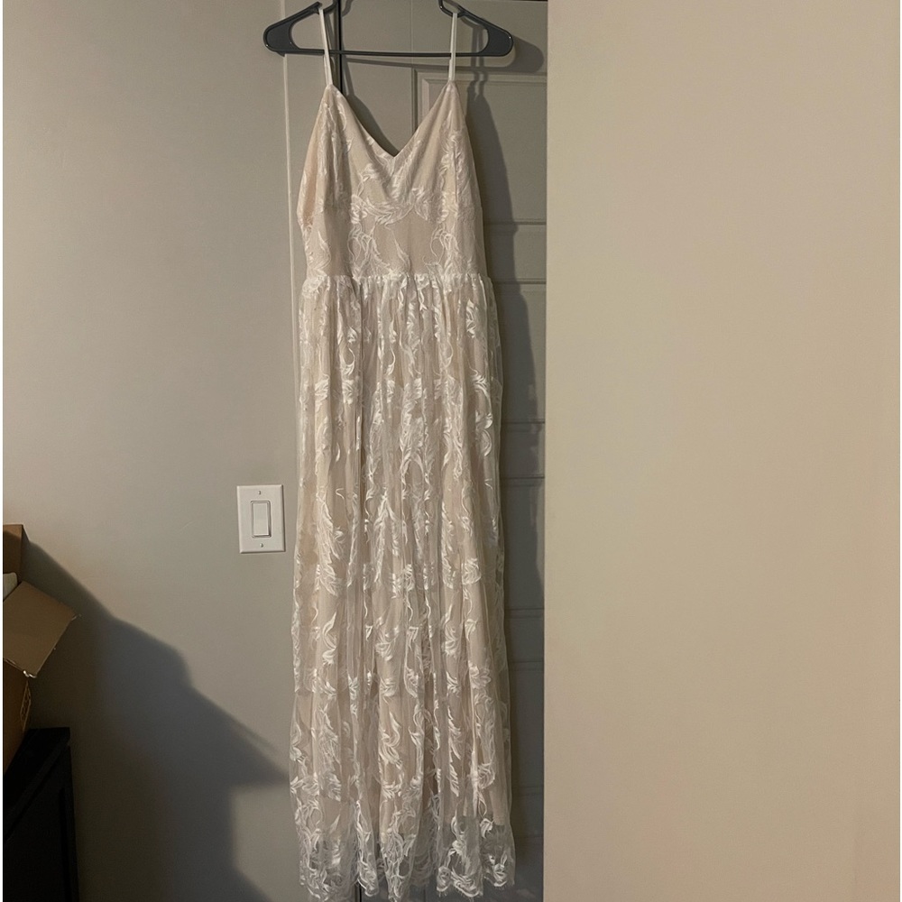 Brand new Baltic Born mid slit dress.